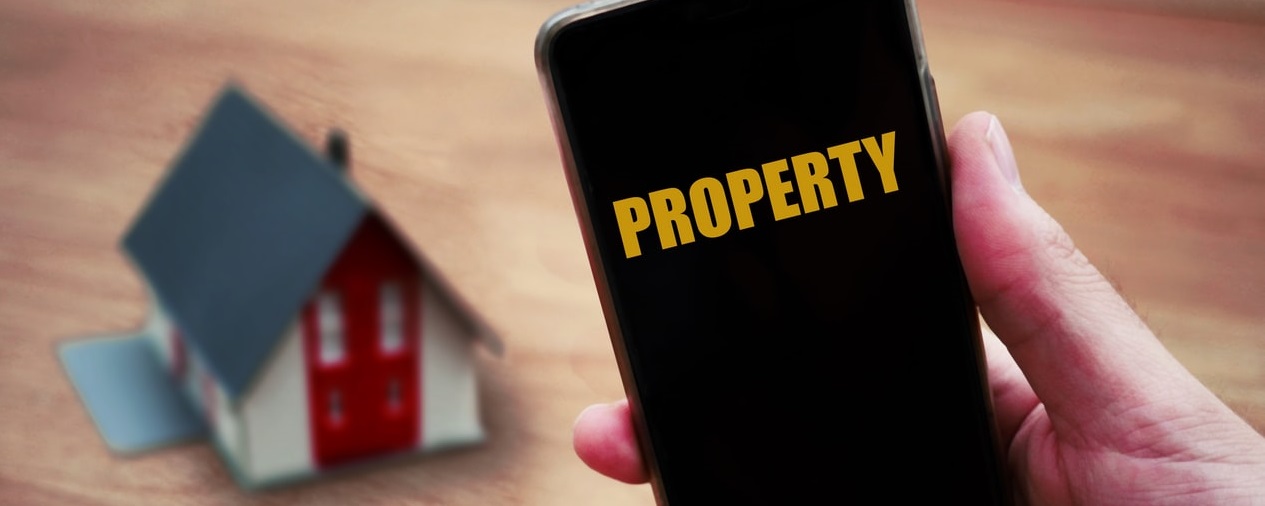 house and phone with property text